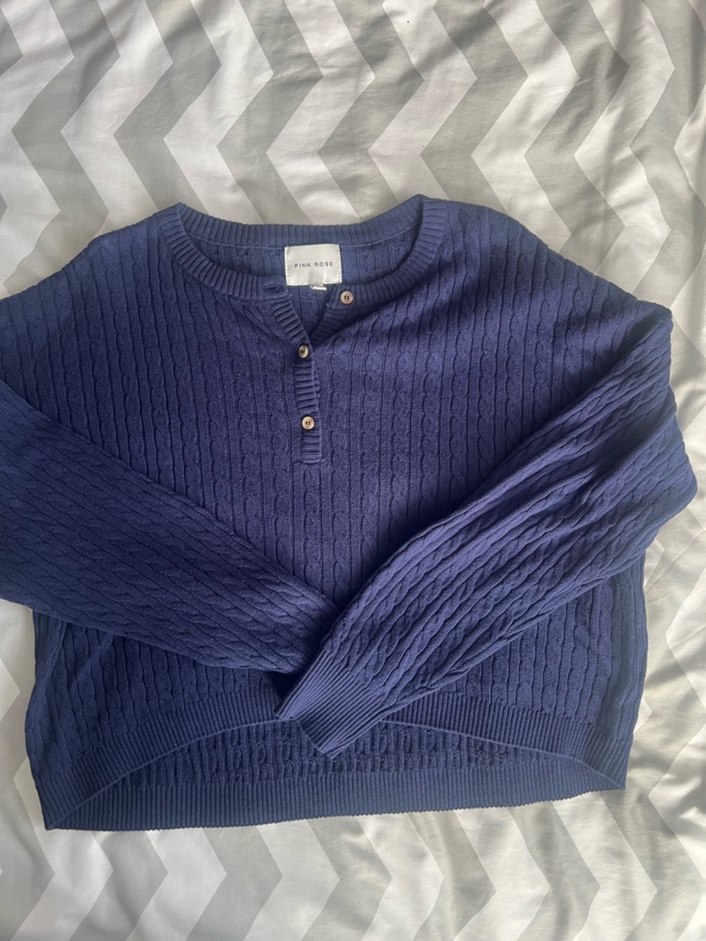 Women’s blue knit style long sleeve top